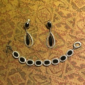 Rhinestone and black bracelet and earrings.
